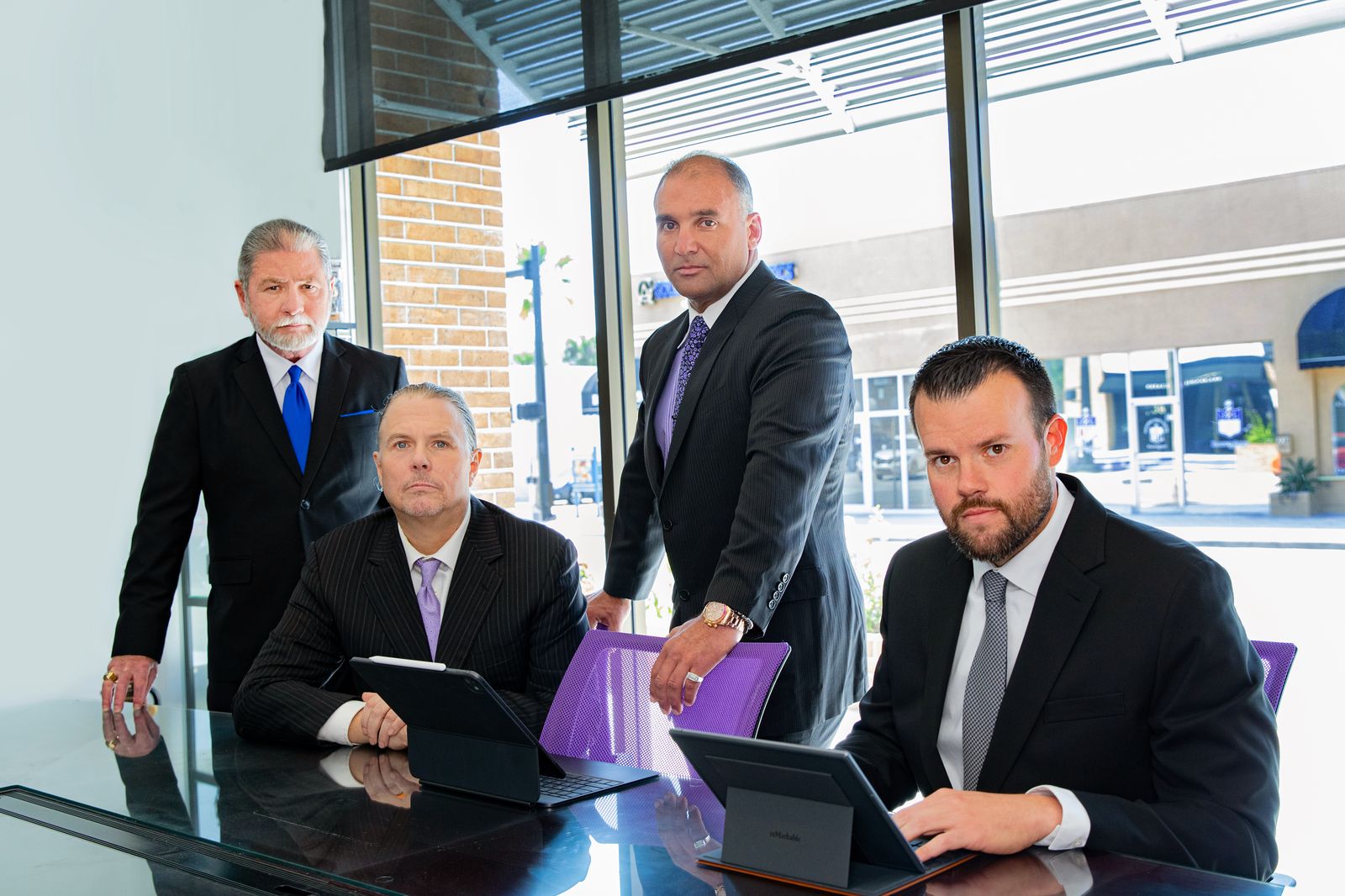 Aaron Delgado & Associates attorney team at the firm's conference room